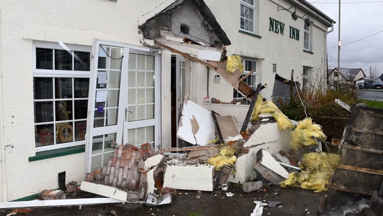 Man ploughs stolen bulldozer into village pub after taunts over marriage breakdown