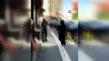 Kavgada hırsını alamayan kadın arabanın üstüne tırmandı