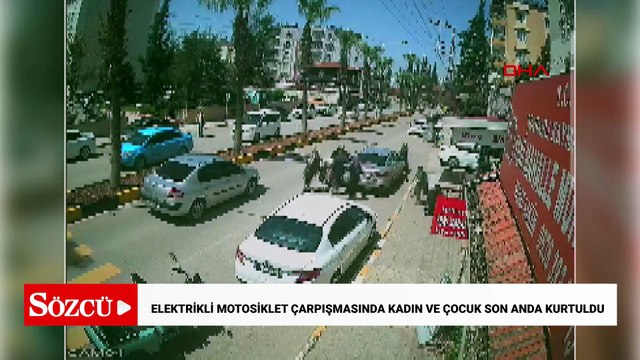 Otomobile çarpan elektrikli motosikletten savrulan kadın ve çocuk, son anda kurtuldu