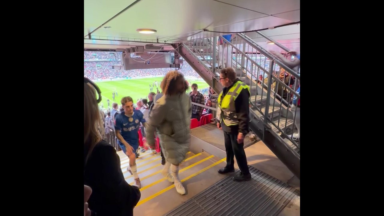 Chelsea walk up the steps at Wembley to collect their losers medals