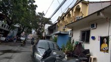 Light Shower on Mindoro Street in Manila City in the Philippines