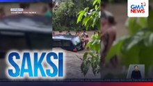 Sasakyan, tumirik sa gitna ng rumaragasang ilog | Saksi