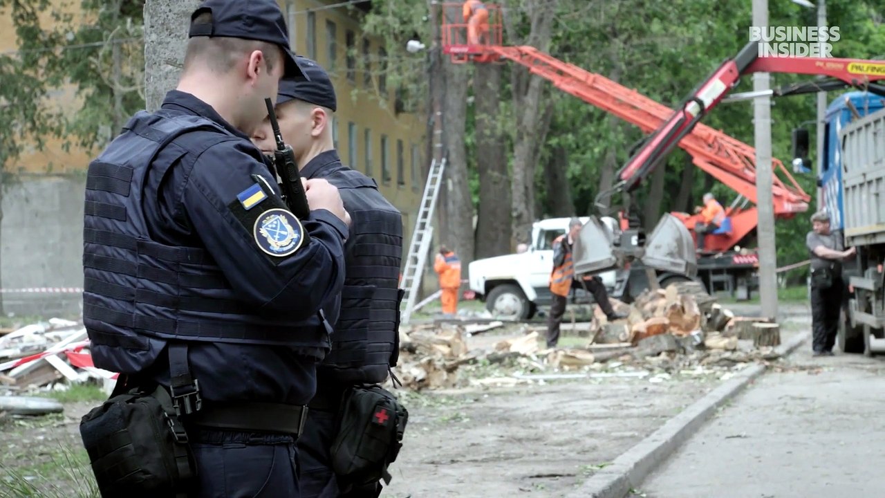 'Thank God, I'm alive': A Russian attack tore open this Ukrainian neighborhood, but residents were quick to start picking up the pieces