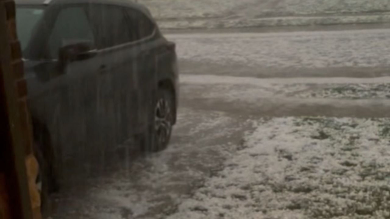 Golf Ball-Sized Hail Pours Down During Storm in...