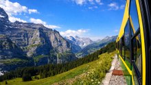Switzerland Mountain Train Ride Through Scenic Landscapes 4K 60fps