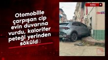 Bursa'da otomobille çarpışan cip evin duvarına vurdu, kalorifer peteği yerinden söküldü