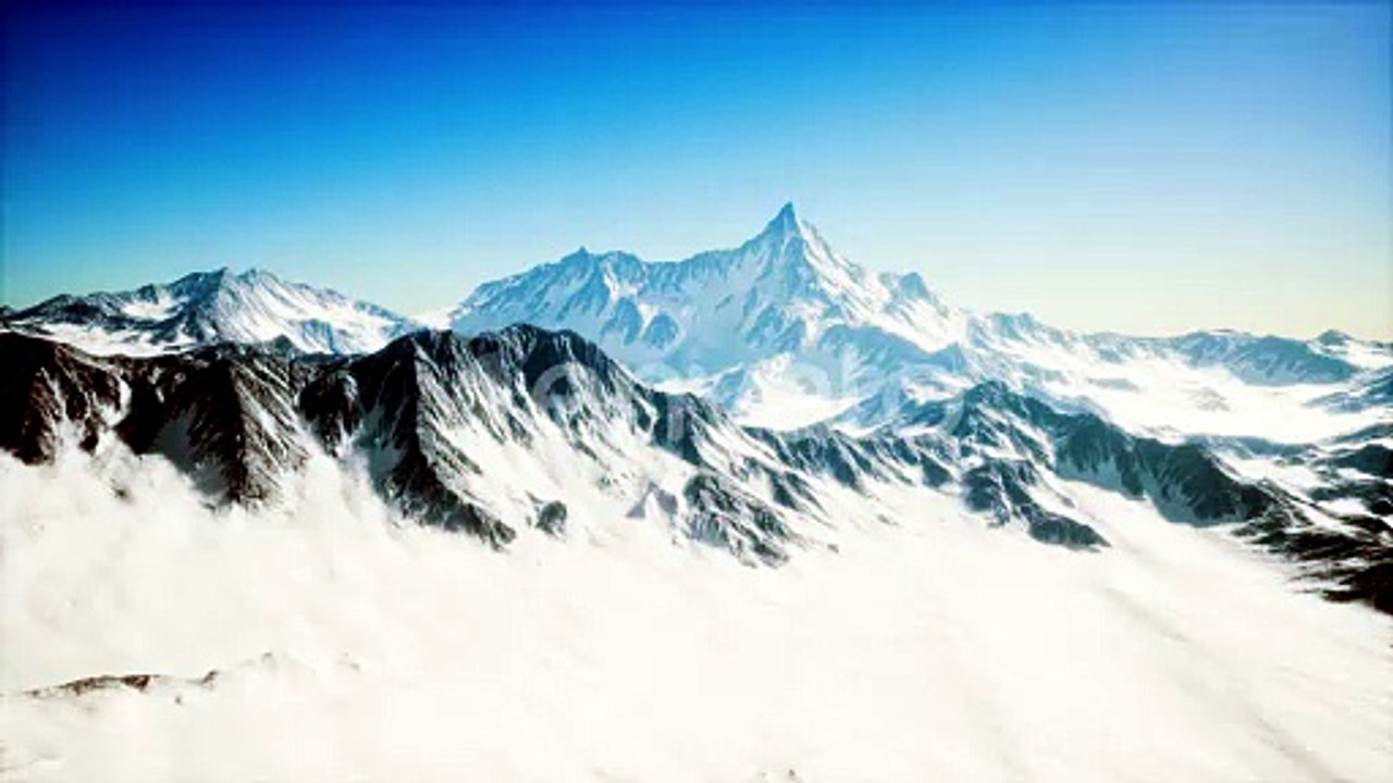 Panoramic Mountain View of Snow Capped Peaks and Glaciers
