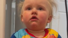 Little feet dance to the melody of Harry Styles