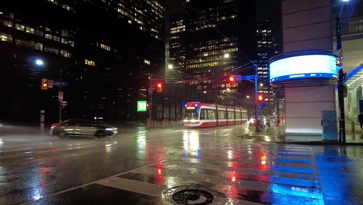 Neon Reflections on Wet Streets – Rainy Night Walk in Toronto