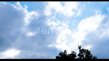 Dramatic Clouds Moving in a Blue Sky