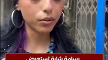 رسامة شابة تستعرض لوحتها في شارع الفن بوسط البلد