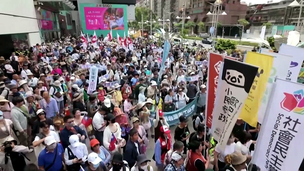 Protests in Taipei after parliament limits defense spending