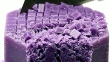 Slicing a soap bar to reveal hidden colorful bands... 😳🧼✨