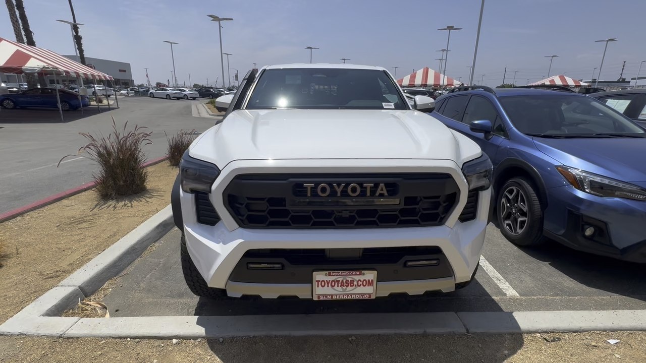 2026 Toyota Tacoma Trailhunter Hybrid 4WD Double Cab with Ice Cap White Walkaround Tour.
