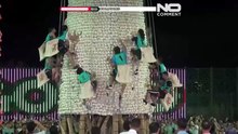 Hong Kong: escaladores disputam subida a torre de pães no colorido Festival do Pão