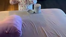 Young girl covers herself and the entire room in diaper rash cream