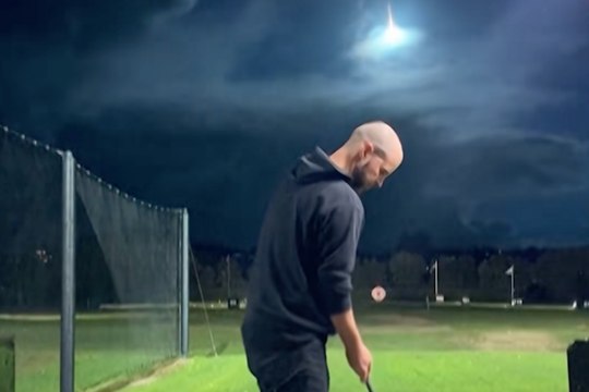 Sydney golfer captures rare meteor fireball streaking over ocean during practice swing
