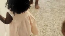Young girl responds to birthday surprise with adult-like composure