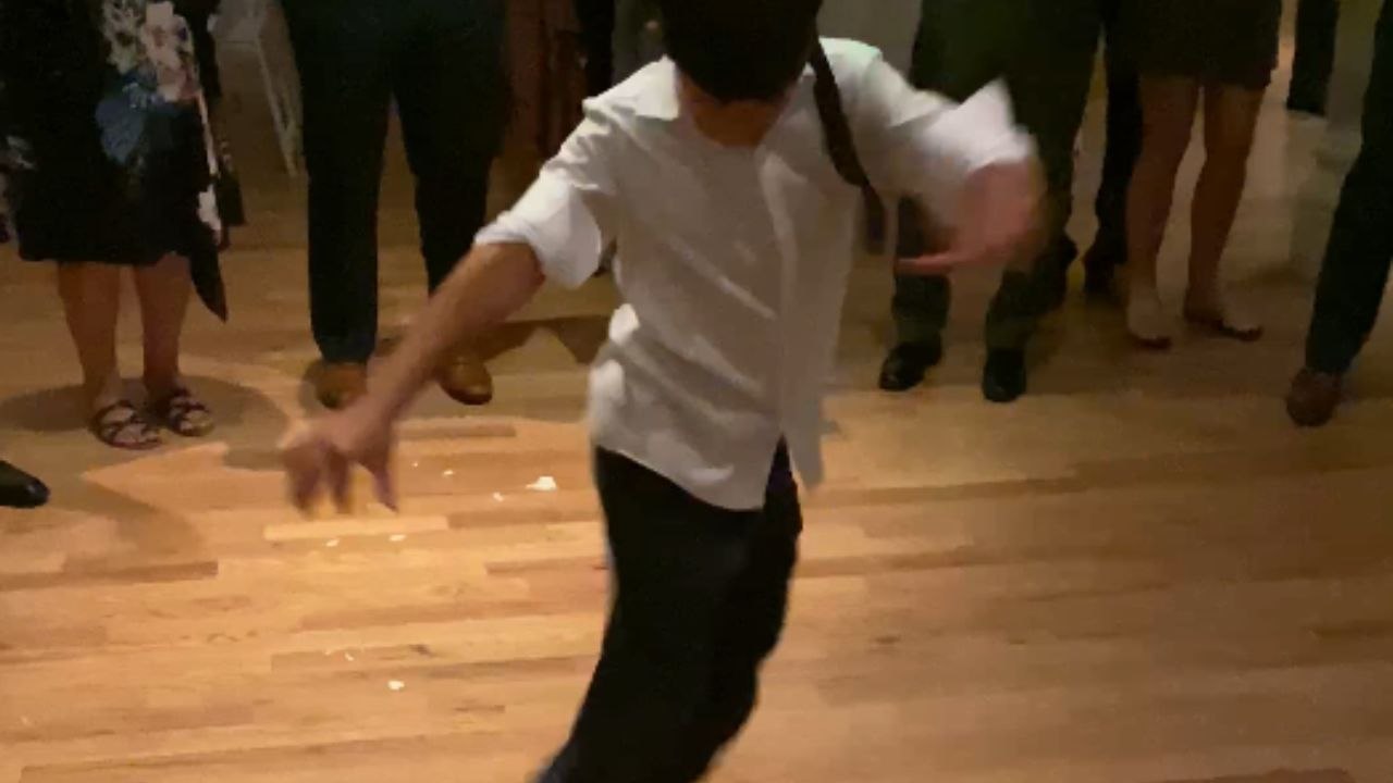 Guy stoles bride's bouquet in midair and gives it to his sister in girls' line