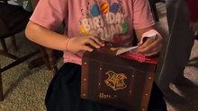 Young girl's heart races after unwrapping a delightful present from grandma