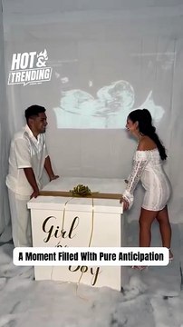 Blue Balloons Emerge From A Big Box During Gender Reveal