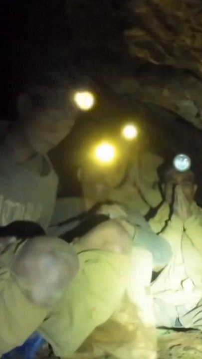 Rescuers locate five villagers trapped in cave in Laos