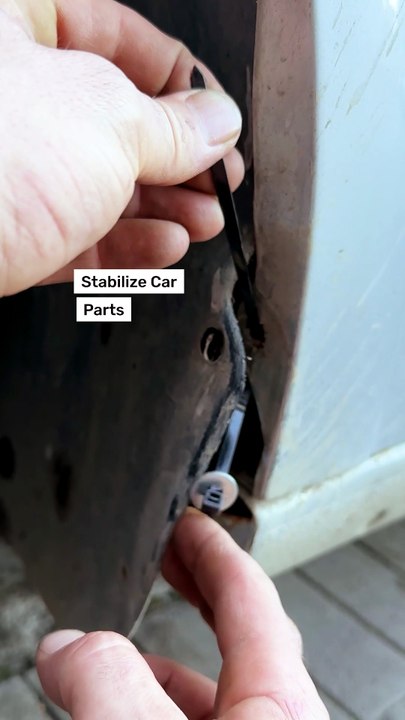 Car parts get stabilized using a zip tie