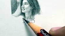 Indian artist draws a stunning, hyper-realistic micro-portrait of his friend