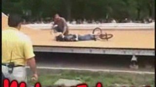 Biker Gets Knocked Out Cold After Landing on his Head