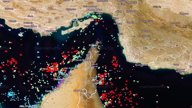 Vessels idle eerily at sunrise on the Strait of Hormuz as waterway remains contested