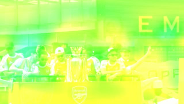 Arsenal parade Premier League trophy through streets