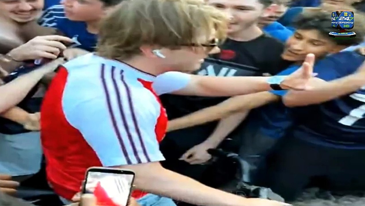 Harrowing Moment: A Lone Arsenal Fan on a bike in Paris is mobbed and roughed up by a jeering group of PSG fans