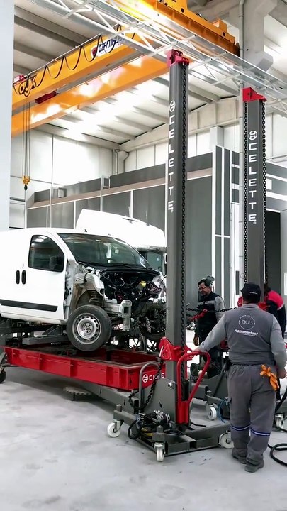 Straightening a Fiat Fiorino chassis using a Celette Menyr truck cab straightening bench.