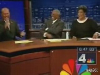 Model falls twice..anchor man laughs