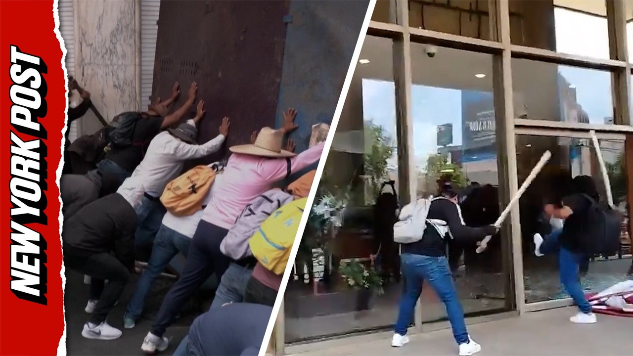 Protesting teachers shatter government building...