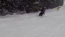Skier Slips And Falls After Trying To Stay Balanced On Slick Ice
