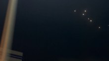 Multiple Missiles Captured Crossing Night Sky Above Tubli