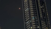 Night Sky Over Dubai Flashes As Air Defense Intercepts Incoming Missile