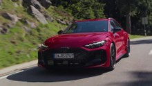 The new Audi RS 5 Avant in Progressive red Driving Video
