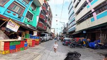 Locals Are Chillin' on Bilbao Street in Manila City in the Philippines