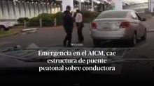 Emergencia en el AICM, cae estructura de puente peatonal sobre conductora