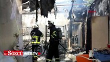 İtfaiyeci duvardaki Türk bayrağını korumaya aldı
