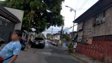 Casual Stroll on T. San Luis Street in Manila City in the Philippines