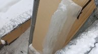 Icicle Falls From Building And Strikes A Window Below