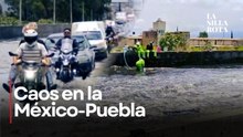 Inundación en la México-Puebla genera caos vial; realizan desazolve de emergencia