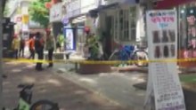 오피스텔 12층서 전자레인지 던진 40대 여성 입건 / YTN