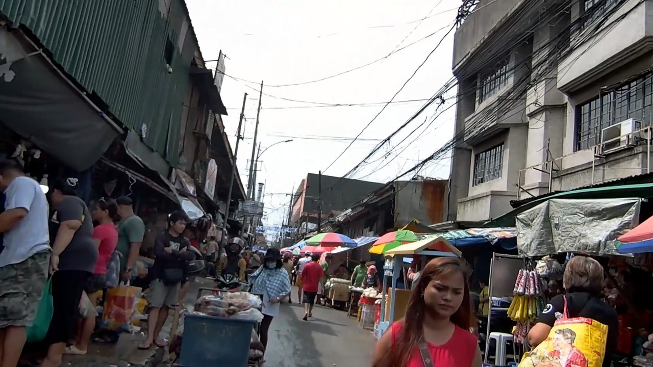 Crowded Market Along Dumalay Street in Quezon City in the Philippines