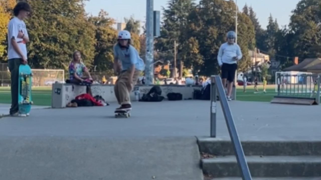 Boy Jumps Onto A Rail With His Skateboard And Wipes Out