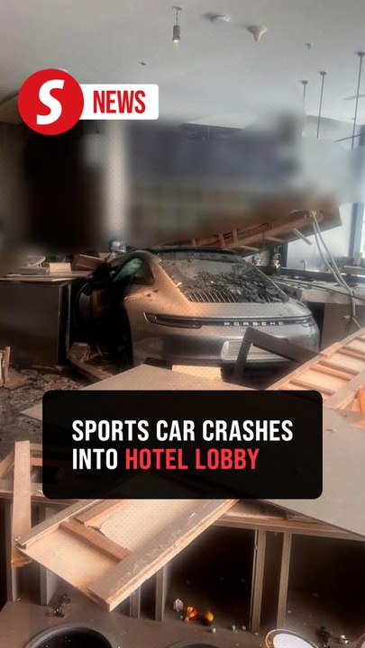 Sports car crashes into hotel lobby after elderly woman accidentally steps on accelerator