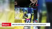 Mini etek giyip peruk takan erkek, mağazadan kilim çaldı; o anlar kamerada